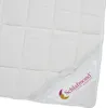 A close-up view of a white quilted mattress topper with a label attached. Produktbild-Vorschau