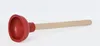A red and wooden plunger is shown against a white background. Náhľad obrázku produktu