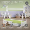 A white wooden teepee-style children's bed with green bedding and a teddy bear, set in a nursery-like room with decorative elements. Produktbild-Vorschau