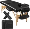 A black massage table with wooden legs and accessories, presented on a white background. Náhled obrázku produktu
