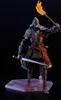 A figure of a knight holding a sword and a torch. Produktbild-Vorschau