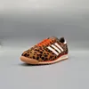 A single Adidas SL 72 OG sneaker with a leopard print pattern is displayed against a plain gray background. Podgląd zdjęcia produktu