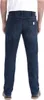 A person wearing dark blue jeans, viewed from the back. Podgląd zdjęcia produktu