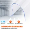 A close-up view of a white PVC strip curtain with a blue border, superimposed over a blurred image of a warehouse interior. Podgląd zdjęcia produktu