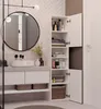 A modern bathroom vanity with a sink, mirror, and a tall storage cabinet filled with toiletries. Produktbild-Vorschau