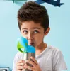 A young boy is drinking from a stainless steel insulated bottle with a blue and green sipper lid. Náhled obrázku produktu