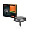 A product shot of a solar-powered outdoor light and its packaging. Produktbild-Vorschau