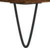 A close-up view of a wooden shelf supported by a black hairpin leg. Anteprima dell’immagine prodotto