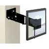 A black TV wall mount attached to a light-colored wall, with a TV screen showing a landscape image attached to the mount. Produktbild-Vorschau