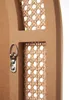 Close-up of a decorative wall mirror frame with woven rattan inserts and a hanging hook. Podgląd zdjęcia produktu