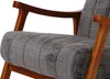 A close-up view of a chair's armrest and seat. Podgląd zdjęcia produktu