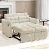 A beige sofa bed is shown in a living room setting, with a fireplace in the background. Podgląd zdjęcia produktu