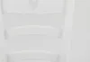 A close-up view of the back of a white chair with a heart cutout. Voir les images du produit