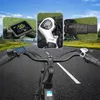 Collage of close-up shots of an e-bike's handlebars and display, superimposed over a road. Produktbild-Vorschau