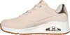 Side view of a beige sneaker. Anteprima dell’immagine prodotto
