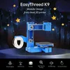 A blue 3D printer is displayed against a dark, starry background with yellow stars and constellation lines. The bottom of the image features icons and text describing product features. Produktbild-Vorschau