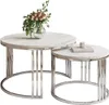 Two round coffee tables with marble tops and silver chrome legs, one slightly smaller and nested under the larger one. A vase of flowers is on the larger table, and a book and candle are on the smaller table. Náhľad obrázku produktu