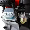 A close-up view of an internal combustion engine's valve cover and carburetor. Produktbild-Vorschau