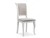 A white dining chair with a beige upholstered seat and backrest, shown against a white background. Podgląd zdjęcia produktu