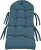 A blue tufted cushion for a rocking chair or lounge chair, shown against a white background. Produktbild-Vorschau