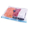 A vacuum-sealed bag containing folded clothes. Anteprima dell’immagine prodotto