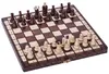 A wooden chess set with pieces arranged on the board. Anteprima dell’immagine prodotto