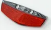A close-up studio shot of a bicycle rear light. Produktbild-Vorschau