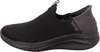 A side view of a black Skechers slip-on sneaker. Náhľad obrázku produktu