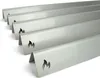 A set of stainless steel aroma rails for a grill, with flame cutouts. Anteprima dell’immagine prodotto