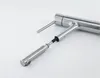 A close-up studio shot of a modern kitchen faucet with a pull-out spray head. Produktbild-Vorschau