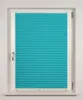 A turquoise pleated blind is shown in a white window frame. Produktbild-Vorschau