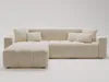 A beige sectional sofa with an ottoman on a white background. Produktbild-Vorschau