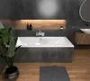 A modern bathroom with a large bathtub, sink, and wooden accents. Produktbild-Vorschau