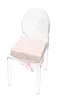 A clear studio shot of a pink seat cushion with a floral pattern on a transparent acrylic chair. Produktbild-Vorschau