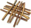 A pile of dried dog chews, likely bull pizzle, arranged on a white background. Podgląd zdjęcia produktu