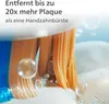 Close-up of toothbrush bristles with water droplets and text overlay. Voir les images du produit