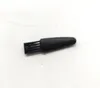 A black grooming brush with bristles on a white background. Produktbild-Vorschau