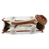 A top-down view of a white tote bag with brown leather trim and straps. Anteprima dell’immagine prodotto