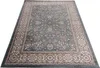 A rug is shown from a diagonal angle on a white background. Voir les images du produit