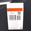 A product tag for a Nike t-shirt. Produktbild-Vorschau