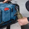 A person is using a Bosch power tool as a bottle opener. Produktbild-Vorschau