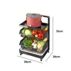 A three-tier kitchen cart filled with vegetables and a pot on top, with dimensions indicated. Produktbild-Vorschau