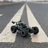 A remote-controlled car is positioned on a road with white lane markings. Náhľad obrázku produktu