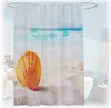 A shower curtain with a beach and seashell motif is displayed in a bathroom setting, partially obscuring a bathtub. Produktbild-Vorschau