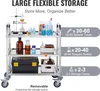 A three-tier stainless steel cart with various laboratory equipment and supplies. Voir les images du produit