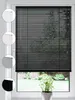 A collage of different colored blinds and a main image of black blinds on a window overlooking a garden. Produktbild-Vorschau