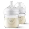 Two Philips Avent baby bottles filled with milk, presented on a white background. Produktbild-Vorschau