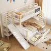 A white and natural wood bunk bed with a slide, stairs, and drawers, set up in a child's room. Náhled obrázku produktu