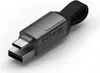 A close-up studio shot of a dark gray charging cable with a USB-C connector and a USB-A connector. Náhled obrázku produktu