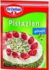 A package of chopped pistachios with a picture of a cake decorated with pistachios and strawberries. Produktbild-Vorschau